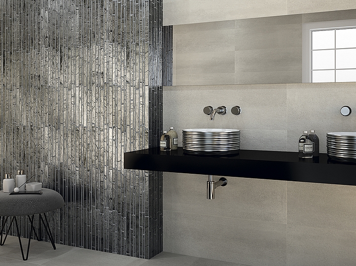 Textured black bathroom tile wall