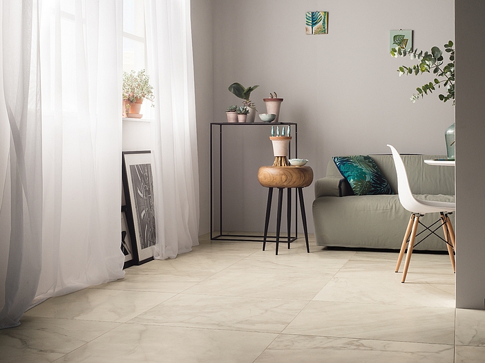 A living room with faux-marble floors