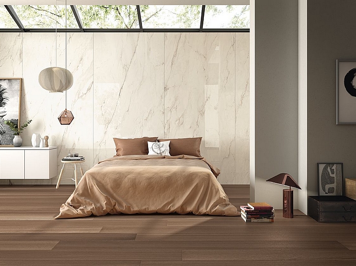 Modern bathroom with beautiful marble-tiled walls